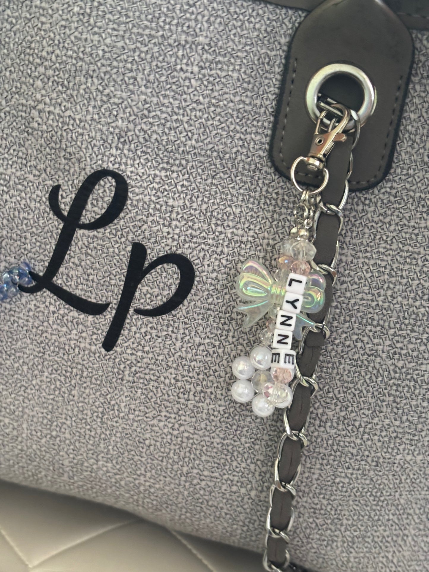 Handmade personalised flower and bow bag charms
