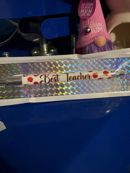 Best teacher pen with apples on