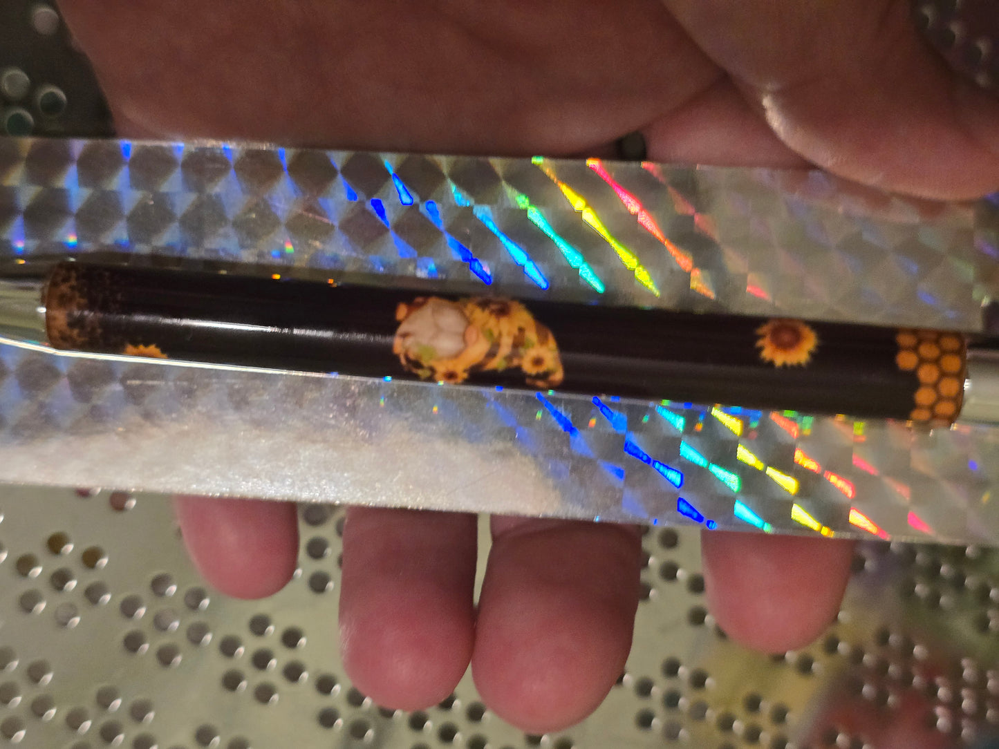 Handmade gnome with sunflower and bees on