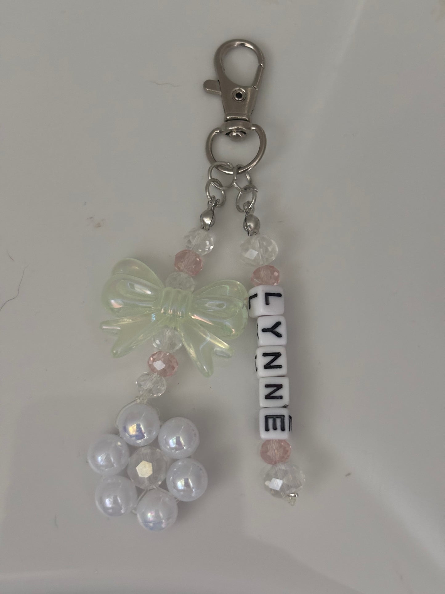 Handmade personalised  flower and bow bag charms