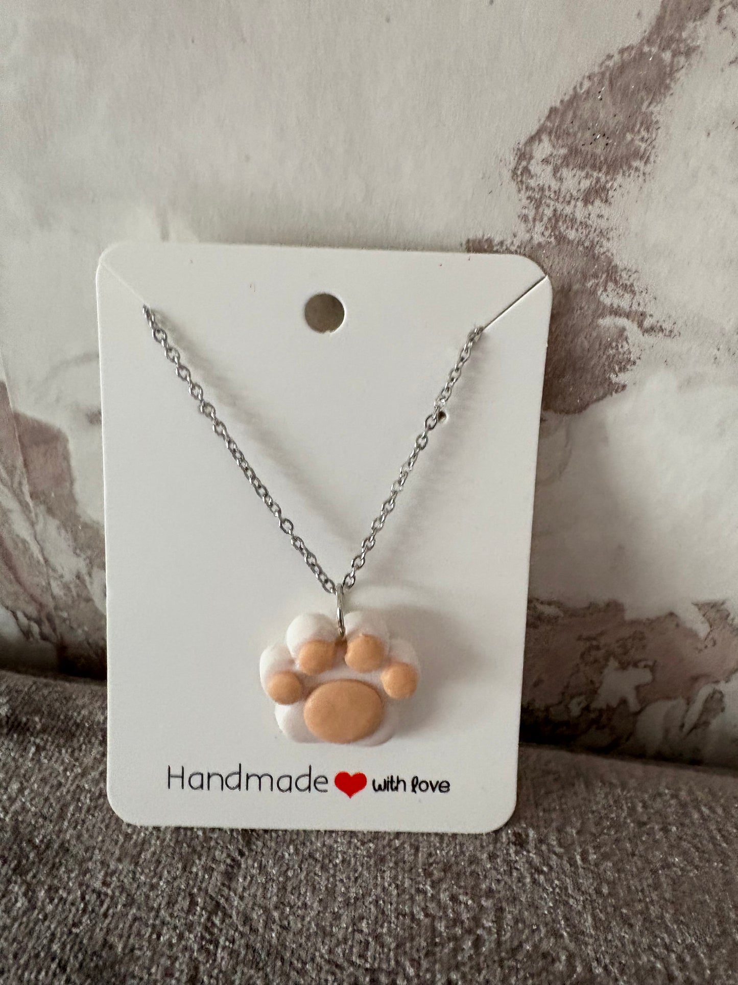 Handmade polymer clay paw necklace