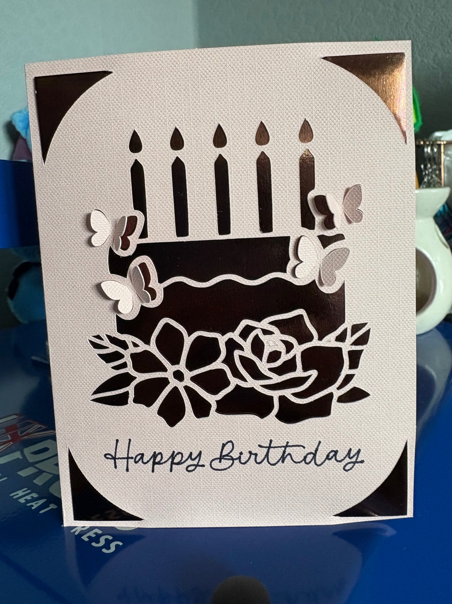 Handmade happy birthday card with cake flowers on