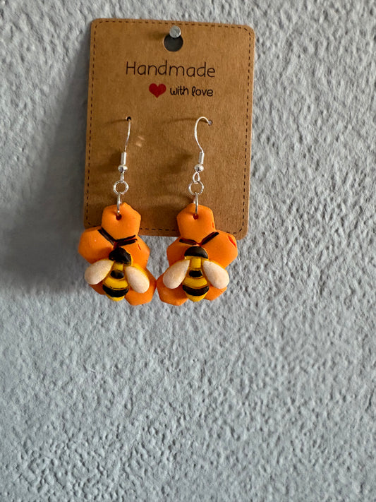 Handmade polymer clay bee and honey comb earrings